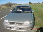 [On the road, in our Nissan Bluebird]