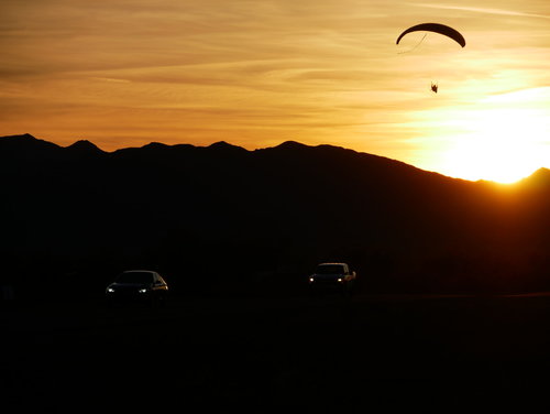 [Paraglider in Sunset Over Cars, Quartzsite]