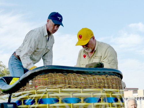 [Balloon Pilot and Co-Pilot Conferring]