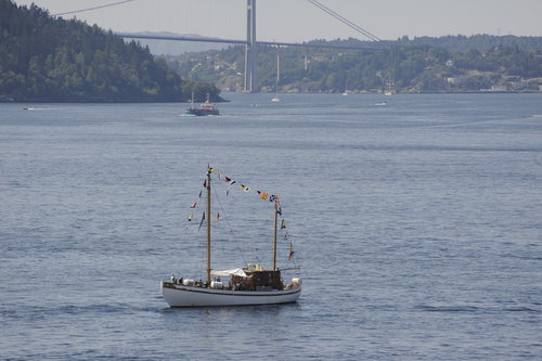 Sailing Boat with Bridge in Background