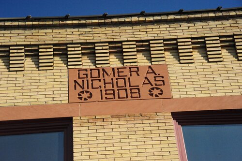 [Sign on Gomer A. Nicholas Building (Built 1908) in Downtown]